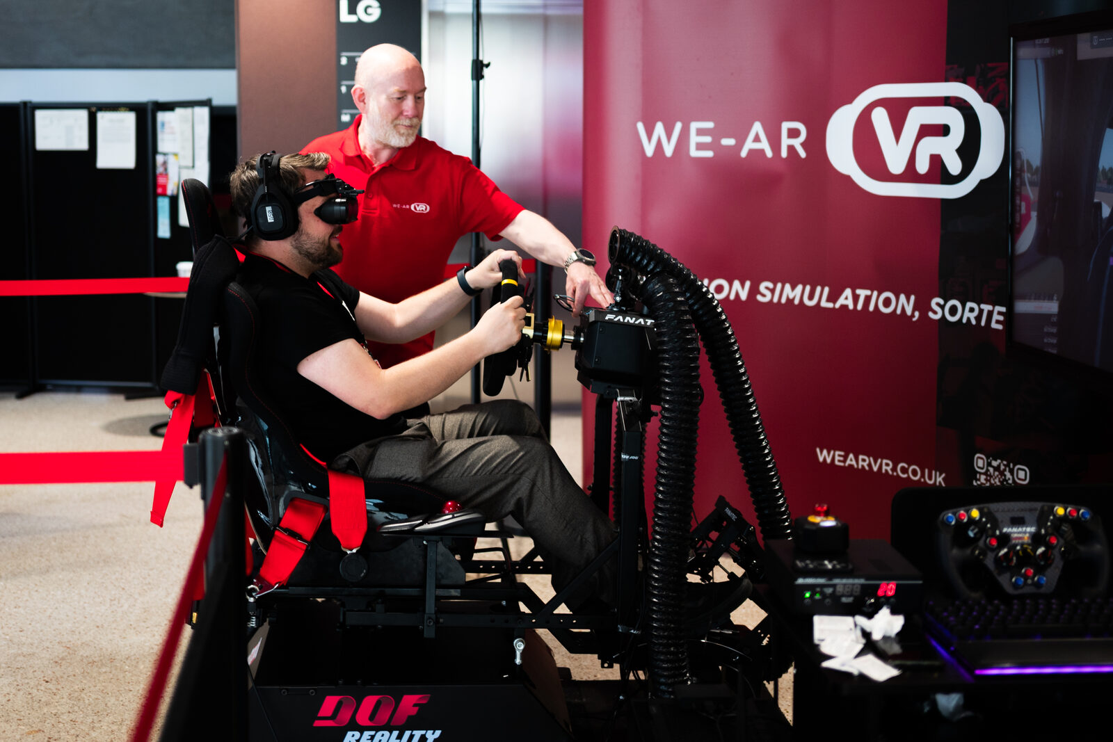 WE-AR VR team coaching a driver at City Hall